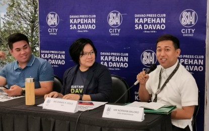 <p><strong>TRANSPORT MODERNIZATION.</strong> Commissioner Norman Baloro (right) of the Presidential Commission for the Urban Poor, the focal person for Davao City's bus system project, reports that as of Feb. 14, 2020, about 365 drivers have already enrolled for NC3 certification for bus driving offered by the Technical Education and Skills Development Authority. In a press conference on Monday (Feb. 17, 2020), he said there are 12,264 drivers and 6,985 operators of public utility jeepneys in the city. <em>(PNA photo by Digna Banzon)</em></p>