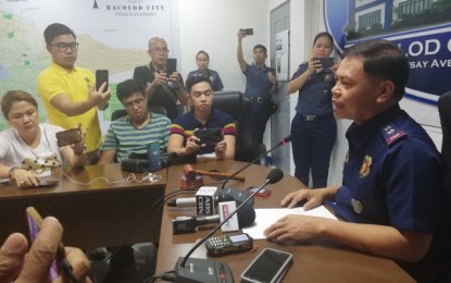 <p><strong>MEET THE PRESS.</strong> Lt. Col. Jovie Espenido (right) talks to reporters during a press conference at the Bacolod City Police headquarters on Wednesday (Feb. 19, 2020). He then left for Iloilo City to report to the Police Regional Office 6 (Western Visayas) in Camp Martin Delgado, where he has been detailed while undergoing an adjudication process. <em>(PNA photo by Nanette L. Guadalquiver)</em></p>