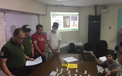 <p><strong>'LIQUID SHABU' PEDDLERS.</strong> PDEA operatives seize syringes containing injectable shabu from two suspects in a buy-bust operation in Mandaluyong City on Thursday (Feb. 20, 2020). The suspects will be charged for violation of the Comprehensive Dangerous Drugs Act of 2002. <em>(Photo courtesy of PDEA)</em></p>
