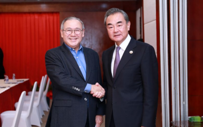 <p><strong>TOP DIPLOMATS.</strong> Chinese State Councilor and Foreign Minister Wang Yi (right) meets with Philippine Foreign Secretary Teodoro Locsin Jr. in Vientiane, Laos Wednesday (Feb. 19, 2020). Locsin said the Philippine government and its people support the effective measures China has taken to fight the coronavirus epidemic. <em>(Xinhua/Kaikeo Saiyasane)</em></p>