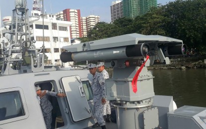 <p><strong>BOOSTING NAVY ASSETS.</strong> A multipurpose attack craft (MPAC) armed with Spike-ER missiles is docked at the pier of Naval Station Jose Andrada in Manila on Sept. 23, 2019. The Philippine Navy said three more assault craft will be armed with missile armament before the end of 2020. <em>(PNA photo by Priam Nepomuceno)</em></p>