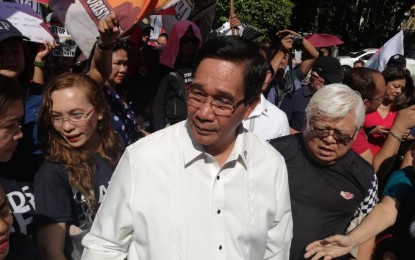 <p><strong>HEARING ON PERJURY RAPS.</strong> National Security Adviser Hermogenes Esperon Jr. is joined by supporters outside the Quezon City Metropolitan Trial Court (MeTC) on Thursday (Feb. 20, 2020). Esperon attended the court's hearing on the perjury raps he filed against RMP national coordinator Elenita Belardo. <em>(PNA photo by Benjamin Pulta)</em></p>
