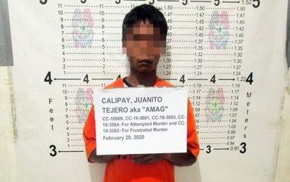 <p><strong>REBEL MILITIA.</strong> Government forces arrest Juanito Tejero Calipay, an alleged militiaman of communist New People’s Army, in an operation Thursday night (February 20) in Purok 6, Diatagon, Lianga, Surigao del Sur. Calipay has five standing warrants of arrest for attempted murder and frustrated murder. <em>(Photo courtesy of Surigao del Sur Provincial Police Office)</em></p>
