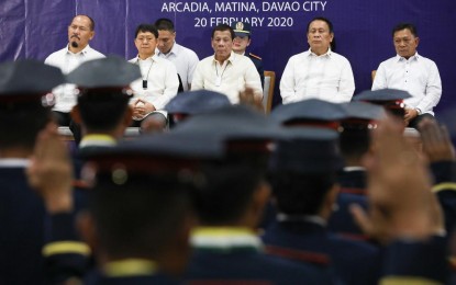 <p><strong>GRADUATION RITES</strong>. President Rodrigo R. Duterte graces the joint graduation ceremony of the Public Safety Officers Basic Course (PSOBC) Class 2019-07 and the Public Safety Officers Advance Course (PSOAC) Class 2019-18 at the Arcadia Active Lifestyle Center in Davao City on Thursday (Feb. 20, 2020). Duterte said he may devote his time giving lectures on criminal law after his terms ends in 2022. <em>(Presidential photo by Toto Lozano)</em></p>