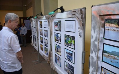 <p><strong>EXHIBIT</strong>. Negros Occidental Governor Eugenio Jose Lacson checks out the photo exhibit on small-scale mining activities in the province during the Governor’s Permit Holders’ Forum and Dialogue held at the Negros Residences in Bacolod City on Friday (Feb. 21, 2020). Organized by the Provincial Environment Management Office, the activity gathered some 200 mining permittees from across Negros Occidental. <em>(Photo courtesy of PIO Negros Occidental)</em></p>