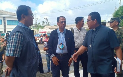 <p><strong>PRELATES FOR PEACE.</strong> Catholic Church Borongan Diocese Bishop Crispin Varquez (right) greets Human Settlements and Urban Development Secretary Eduardo del Rosario (left), the Eastern Visayas cabinet officer for regional development and security, and Presidential Adviser on the Peace Process Carlito Galvez Jr. (center) during the 43rd Samar Island Partnership for Peace and Development meeting in Borongan City, Eastern Samar on Thursday (Feb. 21, 2020). The three Roman Catholic bishops in Samar Island agreed to lead the localized peace talks to finally achieve peace and development in the three provinces. <em>(Photo courtesy of Emy Calagos)</em></p>