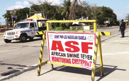 <p><strong>LOCKDOWN</strong>. Nine towns in Isabela are now in lockdown due to the aggravated cases of African swine fever in some areas. Checkpoints have been intensified in the entry and exit points in the province. <em>(PNA photo by Villamor Visaya Jr.)</em></p>