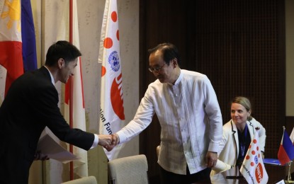 <p><strong>CAPACITY-BUILDING.</strong> Japan Ambassador to the Philippines Haneda Koji shakes hands with UNFPA country representative Iori Kato during the signing of USD1.35-million capacity-building projects in Bangsamoro. Together with the two is International Organization for Migration Chief of Mission Kristin Marie Dadey. <em>(PNA photo by Avito Dalan)</em></p>