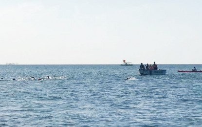 <p><strong>ADVOCACY SWIM.</strong> Noted environmentalist and long- distance swimmer Ingemar "Pinoy Aquaman" Macarine is joined by 12 others as he swims across the Zambuanga Sibugay Bay on Monday morning (Feb. 24, 2020). The swim aims to highlight the importance of marine conservation and the potentials of open water sports in the country. <em>(Photo courtesy of Ingemar Macarine)</em></p>