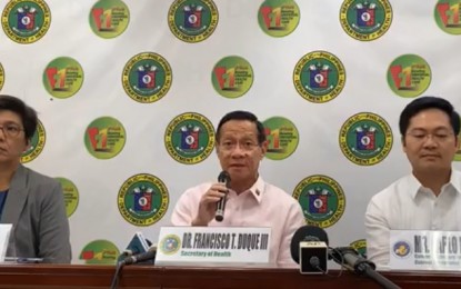 <p><strong>COVID-19 UPDATE</strong>. Department of Health (DOH) Secretary Francisco Duque III says the repatriated overseas Filipinos (OFs) -- 440 crew members and five tourists -- from M/V Diamond Princess Cruise Ship from Japan underwent stringent screenings in the course of their repatriation. Health officials presented updates on Covid-19 during the press briefing held at the DOH main office in Manila on Wednesday (Feb. 26, 2020). Also in photo are DOH Assistant Secretary Maria Rosario Vergeire (left) and Cabinet Secretary Karlo Nograles (right). (<em>PNA photo by Ma. Teresa Montemayor</em>) </p>