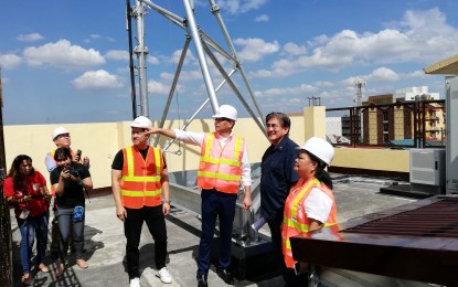 <p><strong>SITE INSPECTION</strong>. Department of Information and Communications Technology (DICT) Secretary Gregorio “Gringo” Honasan II (2nd from right), DITO chief technology officer Rodolfo “Boy” Santiago (3rd from right), and DITO chief administrative officer Adel Tamano (4th from right) during a site inspection of one of DITO's cell towers in Quezon City on Wednesday (February 26). Honasan said the release of the common tower policy, previously announced to be issued back in January, will be released in March--has been delayed to ensure the inclusion of all stakeholders and due to some "explainable" issues. <em>(Photo by Raymond Carl Dela Cruz)</em></p>