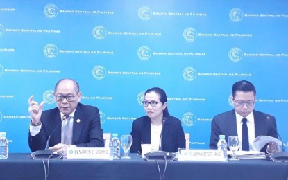 <p><strong>COVID-19</strong>. Bangko Sentral ng Pilipinas (BSP) Governor Benjamin Diokno (leftmost) explains the central bank's initial assessment on the impact of Covid-19 on the economy during a briefing on Thursday (Feb. 27, 2020). He remains confident of 6 percent-level economic growth this year, citing the epidemic still has little impact to the Philippine economy. Also in photo are BSP Managing Director Pia Roman-Tayag and BSP Department of Economic Research Director Dennis Lapid. <em>(Photo by Joann Villanueva)</em></p>