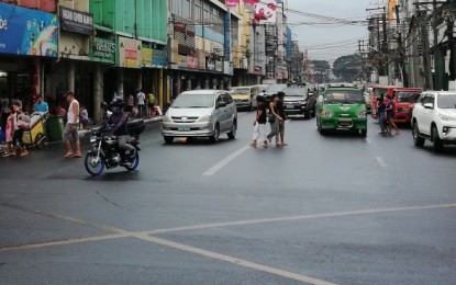 <p><strong>NO TRIKES ALLOWED.</strong> Motor and electric tricycles are prohibited from traversing national highways such as Araneta Street in Bacolod City. The Bacolod Traffic Authority Office has apprehended 121 units since Monday (Feb. 24, 2020) as part of the implementation of DILG Memorandum Circular 2020-036. <em>(PNA Bacolod file photo)</em></p>