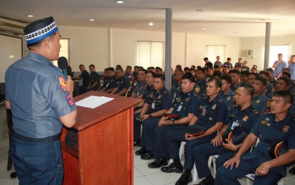 <p><strong>CULTURAL SENSITIVITY.</strong> Capt. Mohammad Jihadi Abdelgafur (left), NCRPO deputy chaplain officer, explains to his fellow police officers Islamic beliefs and practices at the start of the three-day cultural sensitivity training in Camp Bagong Diwa, Taguig City on Thursday (Feb. 27, 2020). The training aims to help Metro Manila police officers further understand and appreciate beliefs, traditions and culture of Muslims. <em>(Photo courtesy of NCRPO PIO)</em></p>