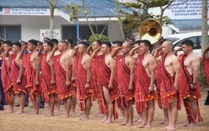 <p><strong>STOCKY, NOT FAT</strong>. Cordillera policemen wearing the native attire stand in attention during an event at the regional headquarters. The Police Regional Office Cordillera is asking the national headquarters to make a different measurement applicable to the stocky built of the Cordilleran. <em>(PNA file photo by Liza T. Agoot)</em></p>