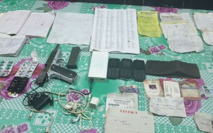 <p><strong>RECOVERED.</strong> A .45-caliber pistol with magazine and ammunition, spent shells from various high-powered firearms, subversive documents and personal belongings recovered by the Army in Damulog, Bukidnon Friday (Feb. 28, 2020). Army personnel confirmed the death of Eduardo Arnado, a New People’s Army combatant whom authorities said has had records of extortion. <em>(Photo courtesy of 3IB)</em></p>