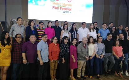 <p><strong>FIRST-EVER SUMMER MMFF.</strong> Members of the Metro Manila Film Festival (MMFF) Executive Committee pose for a photo with representatives of the eight winning films for the coming Summer MMFF this April. MMFF and Metropolitan Manila Development Authority chair Danilo Lim said the SMMFF will be similar to the previous MMFFs in the past, with no compromises on the festival's prizes and incentives. <em>(Photo by Raymond Carl Dela Cruz)</em></p>