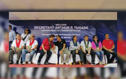 <p><strong>NEW AIR ROUTE</strong>. Mayor Samuel Co of Pagadian City (in red polo) and Department of Transportation Arthur Tugade (in black shirt) engage in a tete-a-tete during the program marking the reopening of the Manila-Pagadian-Manila route of the Philippine Airlines on Sunday (March 1, 2020). Tugade also promised to help renovate the airport's facilities. <em>(PNA photo by Leah D. Agonoy)</em></p>