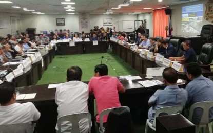 <p><strong>FLYOVER PROJECTS</strong>. The Iloilo Sangguniang Panlalawigan’s committee on infrastructure and the Department of Public Works and Highways, among other stakeholders, conduct a meeting on the preparation for the construction of two flyovers in Iloilo on Monday (March 2, 2020). Engr. Rodney Gustilo of DPWH said the Jibao-an flyover and Buhang flyover will be implemented by March 13 this year. <em>(PNA photo by Gail Momblan)</em></p>