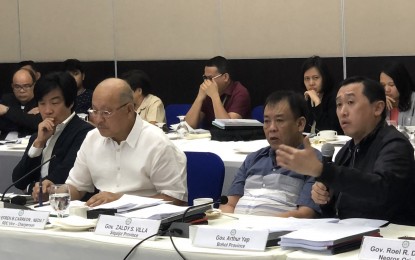 <p><strong>STIMULUS PACKAGE.</strong> Bohol Governor Arthur Yap (right) emphasizes a point during the Regional Development Council (RDC-7) full council meeting in Cebu City on Friday (Feb. 28, 2020). Yap on Monday said he suggested during the meeting the implementation of a stimulus package that will cushion the impact of the global Covid-19 scare to the tourism industry in Central Visayas. <em>(Photo by Angeline Valencia)</em></p>