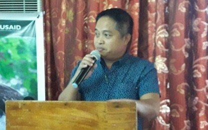 <p><strong>PERSONA NON-GRATA</strong>. Eutiquio Rotaquio Jr, president of the Aurora State College of Technology (ASCOT), reads his memorandum order declaring the Communist Party of the Philippines–New People’s Army (CPP-NPA) as unwelcome in all their campuses, at the Zabali campus in Baler, Aurora on Tuesday (March 3, 2020). The ASCOT is the first school in the province to declare the communist terrorist group as persona non grata. <em>(Photo by Jason de Asis)</em></p>