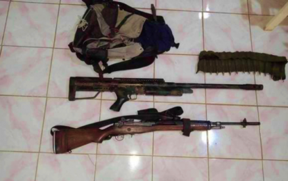 <p><strong>ARMAMENTS OF TERROR.</strong> The homemade .50-caliber sniper rifle and M-14 rifle recovered from two of the three slain Islamic State-inspired Bangsamoro Islamic Freedom Fighters following an encounter Monday (Mar. 2) in Ampatuan, Maguindanao. The slain extremists reportedly belonged to the group of radical preacher Ustadz Karialan that is linked to the series of past bombings in Central Mindanao. <em>(Photo courtesy of 601Bde)</em></p>