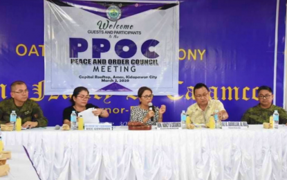 <p><strong>PEACE GAINS.</strong> North Cotabato Governor Nancy Catamco (center) presides over the Provincial Peace and Order Council (PPOC) meeting at the provincial capitol session hall in Barangay Amas, Kidapawan City on Monday (March 2). During the meeting, the governor turned over livelihood assistance to former communist rebels who surrendered to the government under the Enhanced Comprehensive Local Integration Program. <em>(Photo courtesy of North Cotabato PIO)</em></p>