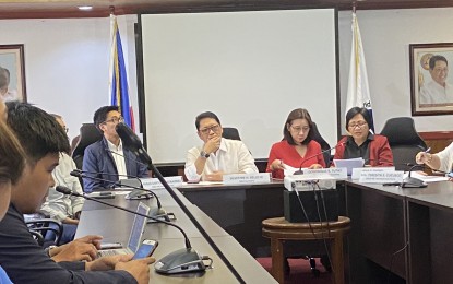 <p><strong>'REPOSITIONING' AID PROGRAMS.</strong> Labor Secretary Silvestre Bello III (center) says the agency is planning to reposition some of its financial programs to sectors that might be affected by the coronavirus disease 2019 (Covid-19) scare, during a press briefing on Wednesday (March 4, 2020). Bello said this includes a plan to link workers to the training-for-work program of the Technical Education and Skills Development Authority.<em> (PNA photo by Ferdinand Patinio)</em></p>