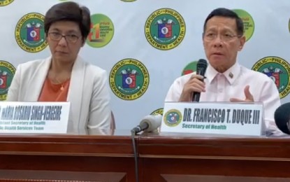 <p>Health Secretary Francisco Duque III (right) during a recent press conference on the update of the Covid-17 situation in the country. </p>