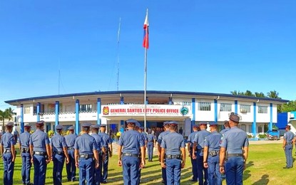 <p>Police personnel stand in formation in front of the main building of the General Santos City Police Office in Camp Fermin Lira (<em>Photo courtesy of the city police</em>) </p>