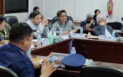 <p><strong>PERSONA NON GRATA.</strong> Department of the Interior and Local Government-7 (DILG-7) regional director Leocadio Trovela (2nd from right) is shown reporting to the Regional Task Force to End Local Communist Armed Conflict (RTF-ELCAC) that 126 of 136 local government units (LGUs) in Central Visayas have passed resolutions declaring the CPP-NPA as persona non grata. Trovela said the remaining eight municipalities and two cities in Cebu are yet to pass their respective resolutions. <em>(Photo courtesy of DILG-7)</em></p>