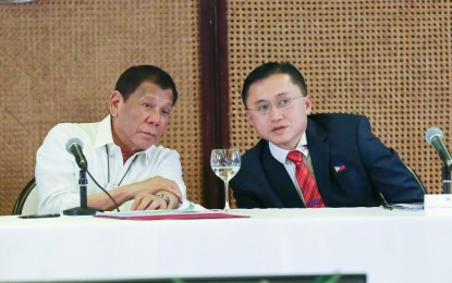 <p><strong>MARAWI REHAB.</strong> President Rodrigo Roa Duterte chats with Senator Christopher "Bong" Go during a meeting to discuss updates on the Marawi Rehabilitation efforts at the Malacañan Palace on Wednesday (March 4, 2020). The Senator held a Senate committee hearing and reported various issues from stakeholders to the President. <em>(Presidential photo by Alfred Frias)</em></p>
