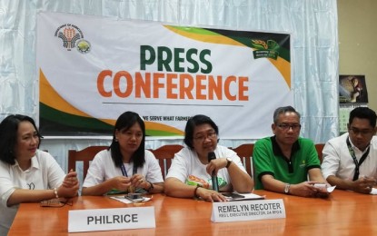 <p><strong>REAPING BENEFITS.</strong> The Department of Agriculture in Western Visayas (DA 6) said on Thursday (Mar. 5, 2020) rice consumers benefited from the Rice Tariffication Law because of the variety of rice choices. Remelyn Recoter (middle), regional executive director of DA 6, says the farmers will reap the direct benefits of the law this year. <em>(PNA photo by Gail Momblan)</em></p>