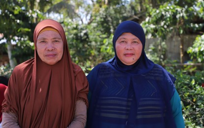 <p><strong>WOMEN POWER. </strong>Mothers in Butig, Lanao del Sur smile as women and children in their community celebrate Eid’l Adha on Aug. 12, 2019. In observance of Women's Month, the Office of the Presidential Adviser on the Peace Process recognizes the role of women in bringing genuine and lasting peace to their communities.<em> (OPAPP photo)</em></p>