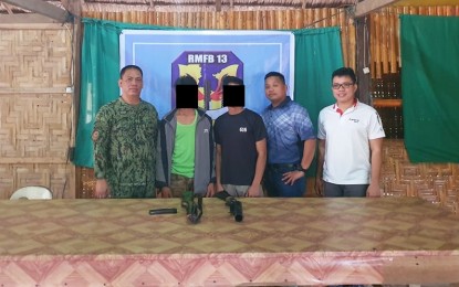 <p><strong>YOUNG FIGHTERS.</strong> Photo shows two of the three young combatants of the New People’s Army (NPA) who surrendered to the Philippine National Police and the Special Forces of the Philippine Army in the province of Surigao del Sur last week. The three will receive financial and livelihood support through the Enhanced Comprehensive Integration Program of the government. <em>(Photo courtesy of PRO-13 Information Office)</em></p>