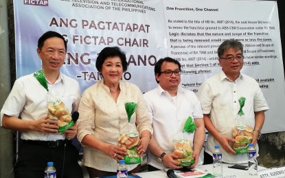 <p><strong>ABS-CBN FRANCHISE ISSUES.</strong> Journalist and 'Pandesal Forum' moderator Wilson Lee Flores (left), Federation of International Cable Television and Telecommunications Association of the Philippines (FICTAP) National Chair Estrellita “Neng” Juliano – Tamano, FICTAP Legal Counsel lawyer Stanley Kristoffer Cabrera, and FICTAP Treasurer lawyer Eusebio Lee discuss the possible granting of multiple frequencies to ABS-CBN by an insertion in the company's renewal of franchise, during the forum at the Kamuning Bakery Cafe in Quezon City on Monday (March 9, 2020). Tamano said such an insertion should not be allowed as a franchise renewal was simply meant to renew, with nothing to add or remove. <em>(Photo by Raymond Carl Dela Cruz)</em></p>