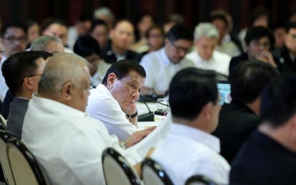 <p><strong>GAME CHANGER.</strong> President Rodrigo Roa Duterte holds a meeting with the Inter-Agency Task Force for the Management of Emerging Infectious Diseases at the Malacañan Palace on Monday night (March 9, 2020). Duterte urged the barangay officials to be a game changer by intensifying the fight against the infectious disease. <em>(Presidential photo by Robinson Niñal Jr.)</em></p>