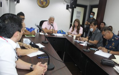<p><strong>RESTRICTED ENTRY</strong>. Angeles City Mayor Carmelo Lazatin Jr. (center) meets with police officials and other city officers on Tuesday (March 10, 2020) to discuss precautionary measures against the coronavirus disease 2019 (Covid-19). The measures include the restricted entry of foreign nationals from Covid-19-affected countries through the setting up of 24-hour checkpoints in all entry and exit points of Angeles City, Pampanga. <em>(Photo courtesy of the Angeles City government)</em></p>