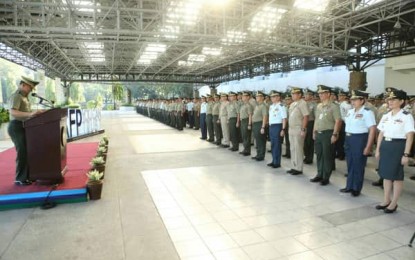 <p><strong>WOMEN EMPOWERMENT.</strong> Armed Forces of the Philippines (AFP) chief, Gen. Felimon Santos Jr. (left), cites the role of women in nation-building in his address before AFP personnel and officials during the flag-raising ceremony in Camp Aguinaldo on Monday (March 9, 2020). Santos said the AFP is a strong advocate of women's rights and called on Filipinos to work together to make change work for women. <em>(Photo courtesy of AFP Public Affairs Office)</em></p>