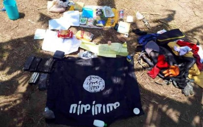 <p><strong>SEIZED.</strong> Government troopers seize more bombs and bomb-making components in an abandoned lair of the Islamic State-linked Bangsamoro Islamic Freedom Fighters (BIFF) in the mountains of Ampatuan, Maguindanao on Tuesday (March 10, 2020). Among the belongings left behind by fleeing BIFF radicals was a black flag of the terror Islamic State of Iraq and Syria. <em>(Photo courtesy of 6ID)</em></p>