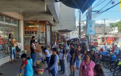 <p><strong>AVOID CROWDS.</strong> A sidewalk in downtown Tacloban City. The Department of Health regional office here on Tuesday strongly urged the public to avoid crowded places and mass gatherings with the rising cases of coronavirus disease 2019. <em>(PNA photo by Gerico Sabalza)</em></p>