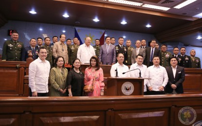 <p><strong>CONFIRMED.</strong> Members of the Commission on Appointments (CA) pose with 22 ranking military officials after the body confirmed their promotion to the next higher rank at the Senate on Wednesday (March 11, 2020). The CA also confirmed the appointments of some reservists, including Davao City Mayor Sara Duterte and Davao City 3rd District Representative Isidro Ungab to the rank of Colonel. <em>(Photo courtesy of AFP Public Affairs Office)</em></p>