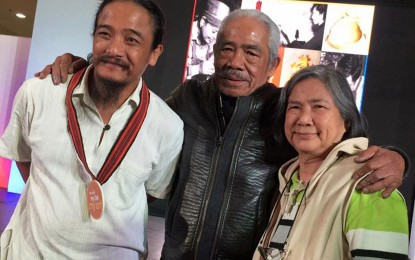 <p><strong>FATHER, MOTHER, SON</strong>. The Villanuevas led by the late artist Ben-Hur Villanueva (center), his muse and wife Lolit and son Bumbo or known in the Facebook circle as Ben-Hur the Younger. The Villanueva clan canceled on Sunday’s (March 15) tribute exhibit about Ben-Hur's life, work and stay in Baguio City due to coronavirus disease 2019 (Covid-19) threat. <em>(PNA photo from the Facebook page of Ben-Hur the Younger)</em></p>