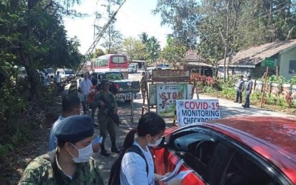<p><strong>TRAVEL BAN</strong>. Personnel of the Philippine Army's 91st Infantry Battalion implement the order that temporarily prohibits the entry of tourists and non-residents in the province of Aurora. Acting Governor Christian Noveras issued the order on Sunday, March 15, 2020, to prevent the transmission of the 2019 coronavirus disease (Covid-19). <em>(Photo courtesy of the Army's 91st Infantry Battalion)</em></p>