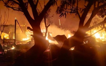 <p><strong>RESIDENTIAL FIRE</strong>. A fire razed nine houses in Urdaneta City, Pangasinan on Sunday evening (March 15, 2020). The fire reached a second alarm before it was declared fire out. <em>(Photo courtesy of Urdaneta City BFP's Facebook page)</em></p>