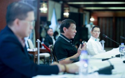 <p><strong>LUZON-WIDE QUARANTINE.</strong> President Rodrigo Roa Duterte presides over a meeting with the Inter-Agency Task Force for the Management of Emerging Infectious Diseases at the Malacañan Palace on Monday (March 16, 2020). Duterte later placed the entire Luzon under enhanced community quarantine to prevent the spread of coronavirus disease. (<em>Presidential photo by Karl Norman Alonzo)</em></p>