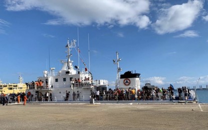 <p><strong>STRANDED TOURISTS.</strong> The Philippine Coast Guard boat carrying tourists from Bohol is seen docking at the Pier 1 in Cebu City. The Tourism, Cultural and Historical Affairs Commission (TCHAC) of Lapu-Lapu City on Tuesday (March 17, 2020) assisted 135 tourists of different nationalities who were stranded in Bohol, Siquijor and Negros Oriental because of the state of general community quarantine in Cebu.<em> (Photo courtesy of Edward S. Mendez)</em></p>