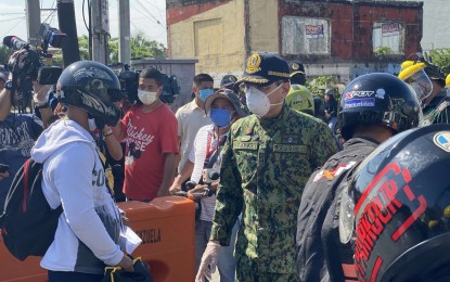 <p><strong>CHECKPOINT. </strong>PNP Deputy Chief for Operations, Lt. Gen. Guillermo Eleazar inspects a checkpoint in Bulacan on Thursday (March 19, 2020). The Joint Task Force Corona Virus Shield (JTF CV Shield), led by Eleazar, has formed a simple guide on checkpoint exemptions in line with the Luzon-wide enhanced community quarantine. <em>(Photo courtesy of Office of the PNP Deputy Chief for Operations)</em></p>