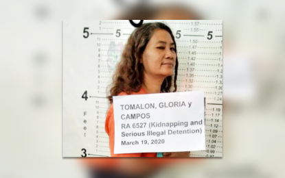 <p><strong>BUSTED.</strong> Joint forces of the Philippine Army and the Philippine National Police nab Gloria Campos Tomalon, an alleged officer of the communist New People’s Army (NPA) in an operation conducted on Thursday (March 19, 2020) in Barangay Diatagon, Lianga, Surigao del Sur. Authorities say Tumalon is wanted by the law for various crimes. <em>(Photo courtesy  3SFBN)</em></p>