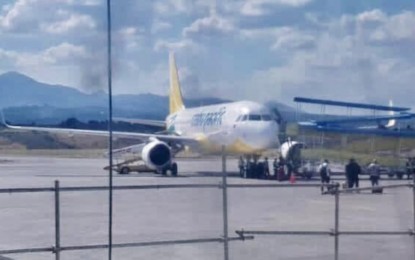 <p><strong>RECOVERY FLIGHT.</strong> The Department of Tourism flies out on Thursday afternoon at least 56 stranded foreign tourists from the General Santos City International Airport to the Clark International Airport in Pampanga. The special commercial flight of the Cebu Pacific (in photo) was supported by the city government and the Civil Aviation Authority of the Philippines. <em>(Photo grab from the Facebook page of the City Economic Management and Cooperative Development Office)</em></p>